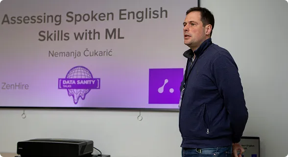 Logikka team member presenting on Assessing Spoken English Skills with ML